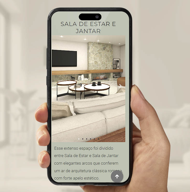 Close em mão segurando celular que exibe projeto de Interiores